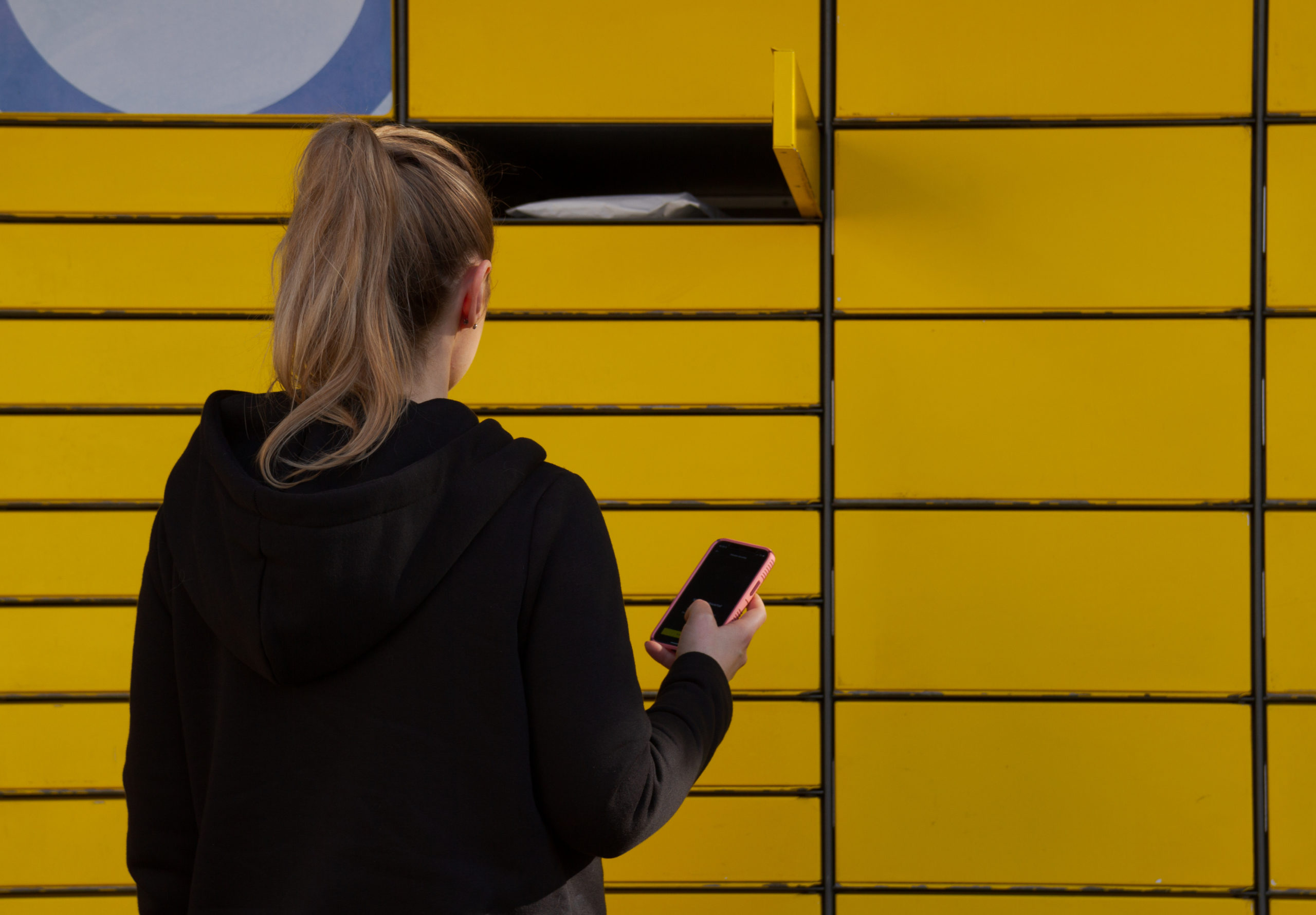 university smart locker - student retrieving package