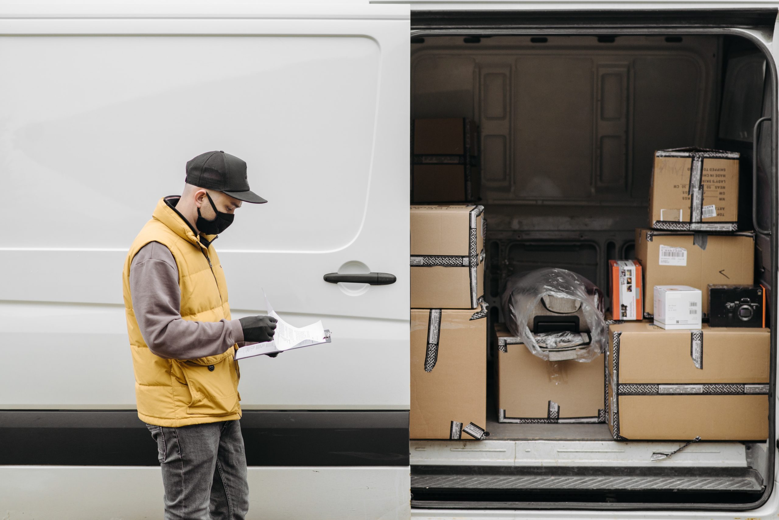 Last-mile worker preparing to deliver parcels